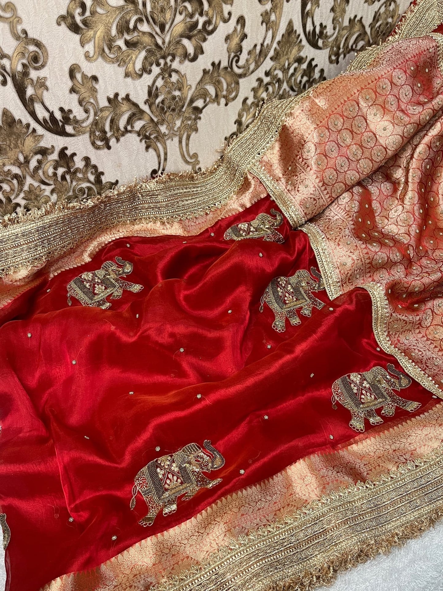 Hand-Embroidered Red Tissue Silk Saree with Elephant Motifs