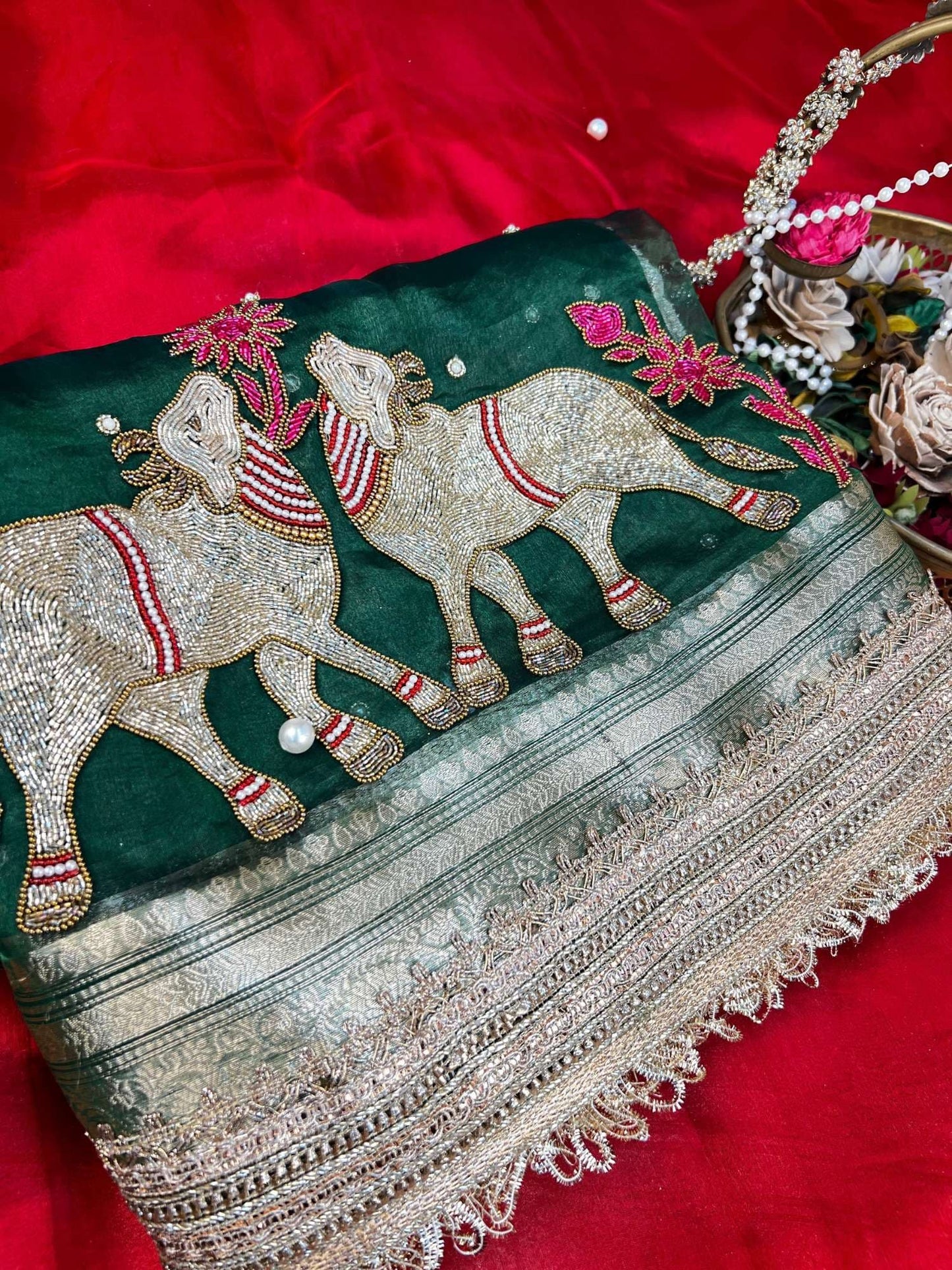 Manatavya Banaras bottle green Pichwai pure Banarasi tissue silk saree featuring intricate Pichwai motifs, rich zari work and regal festive elegance