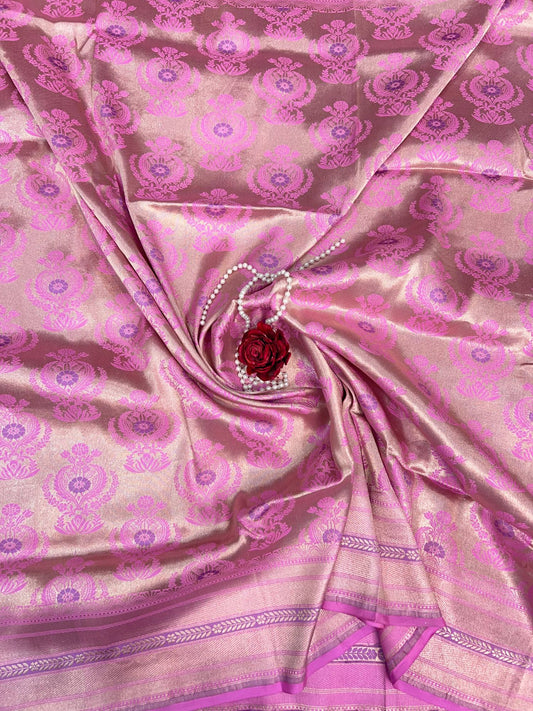 “Pink Katan Silk saree with elegant weaving and festive design”