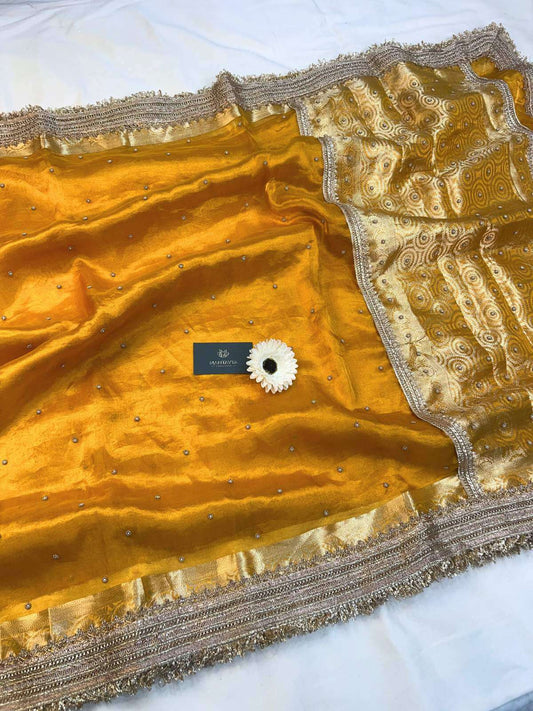 Manatavya Banaras yellow tissue silk saree with luxurious sheen and traditional Banarasi craftsmanship