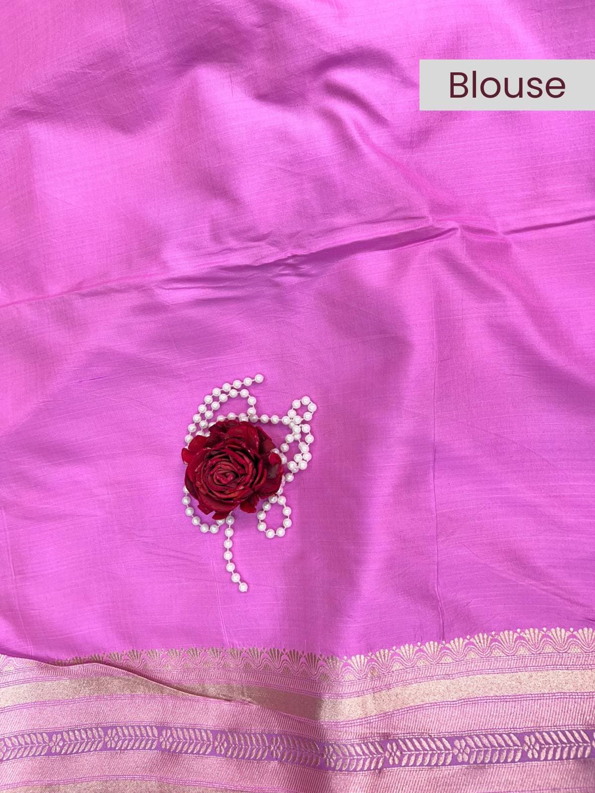 “Pink Katan Silk saree with elegant weaving and festive design”