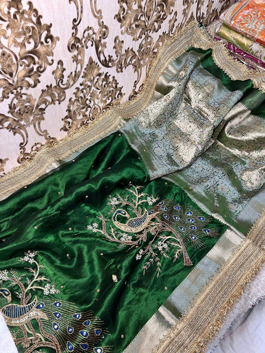 “Bottle Green Morni silk saree with intricate design and festive appeal”