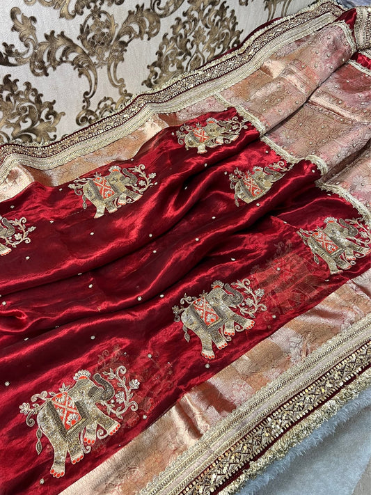 “Red Shahi Gaj saree with rich embroidery and traditional motifs for festive occasions”
