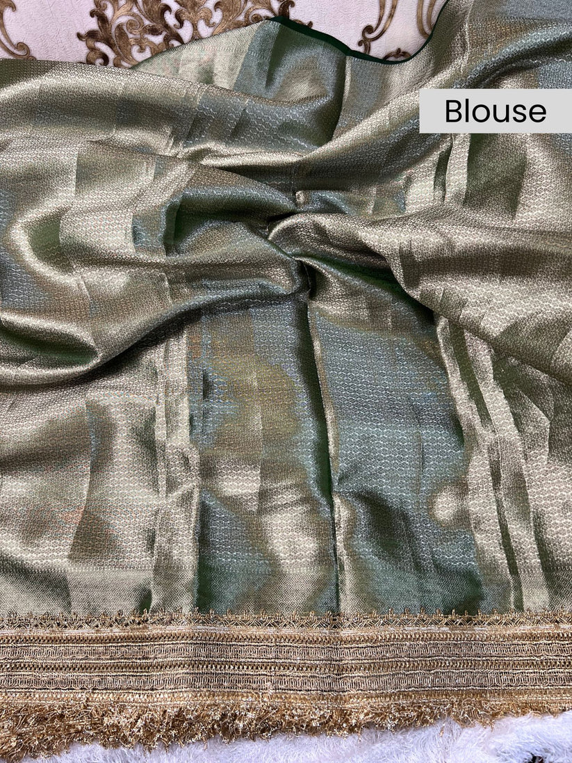 Manatavya Banaras bottle green Pichwai pure Banarasi tissue silk saree featuring intricate Pichwai motifs, rich zari work and regal festive elegance