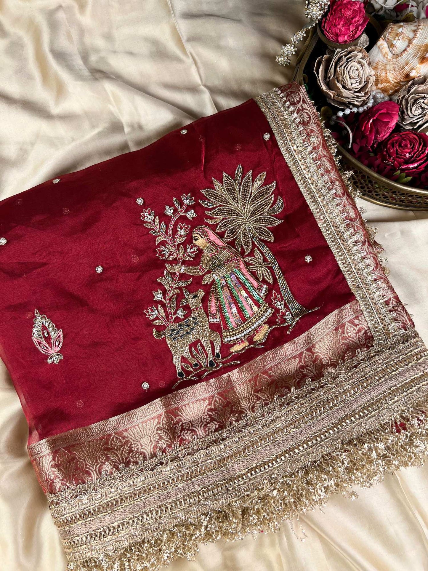 Manatavya Banaras maroon Vanika pure Banarasi tissue silk saree with intricate zari weaving, elegant floral motifs front view