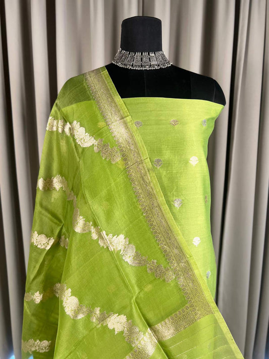 Lime Green Chiniya Suit with Golden Buti closeup view