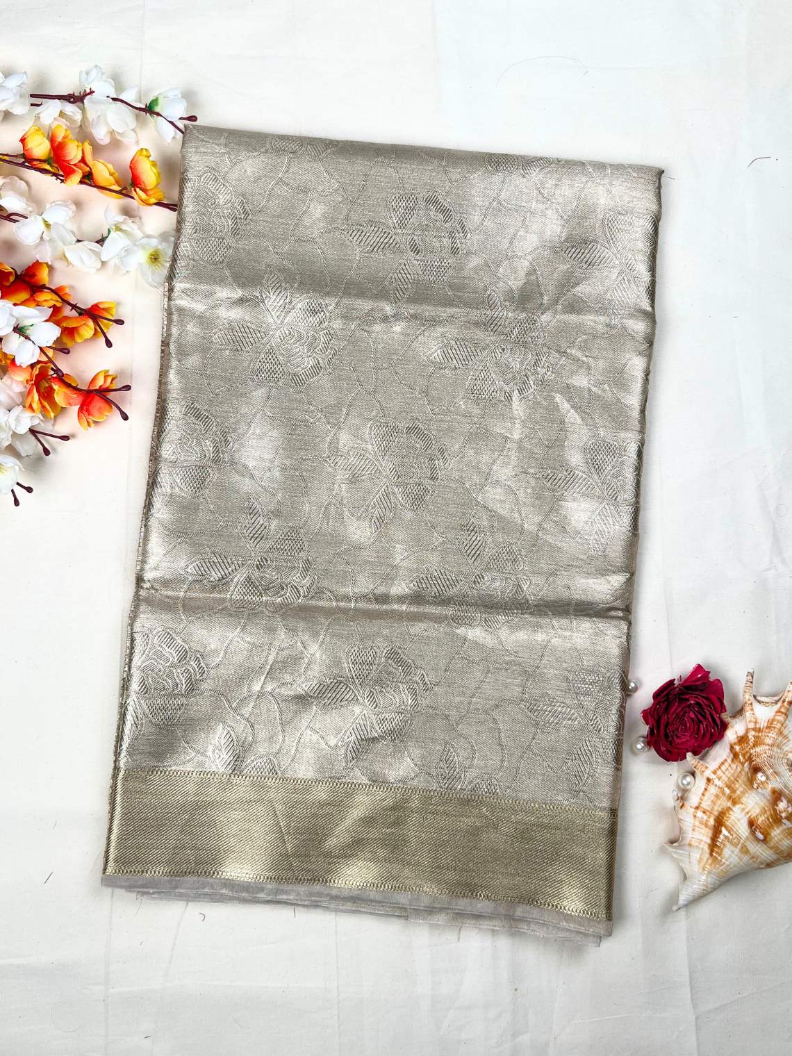 Manatavya Banaras golden brocade tissue silk saree with rich zari weaving, luminous sheen and regal traditional elegance