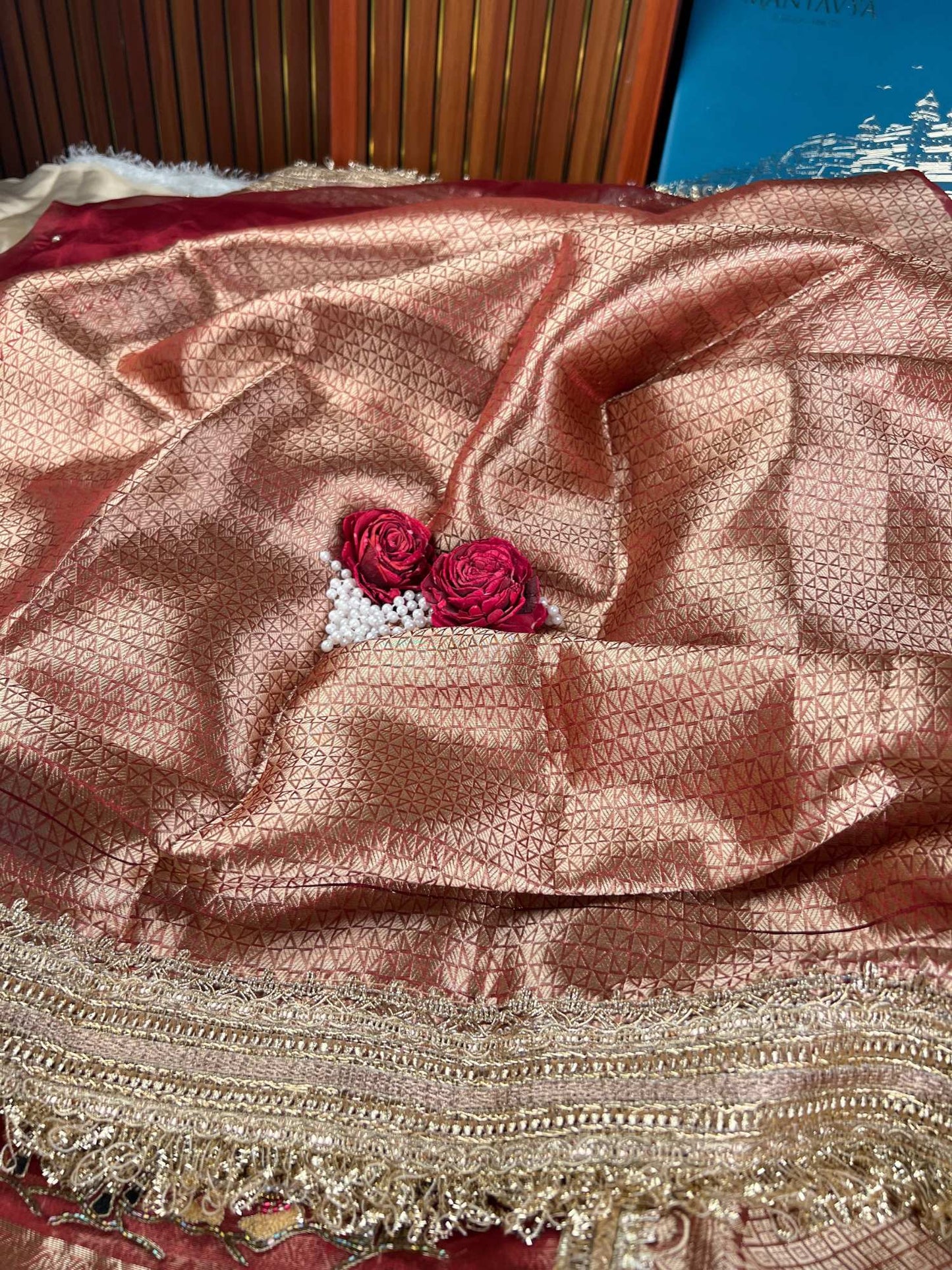Manatavya Banaras maroon Vanika pure Banarasi tissue silk saree with intricate zari weaving, elegant floral motifs and traditional festive elegance
