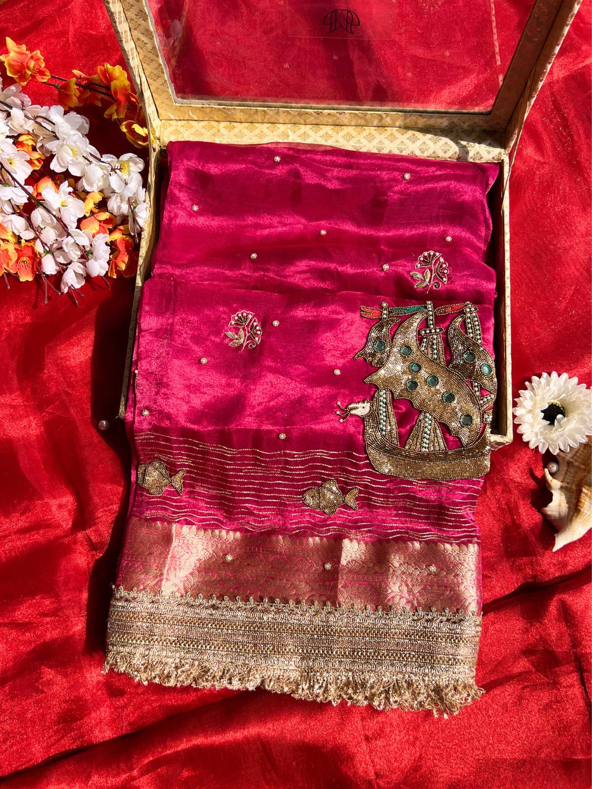 Hot pink Tissue Silk Saree with Hand Embroidered ship Front view