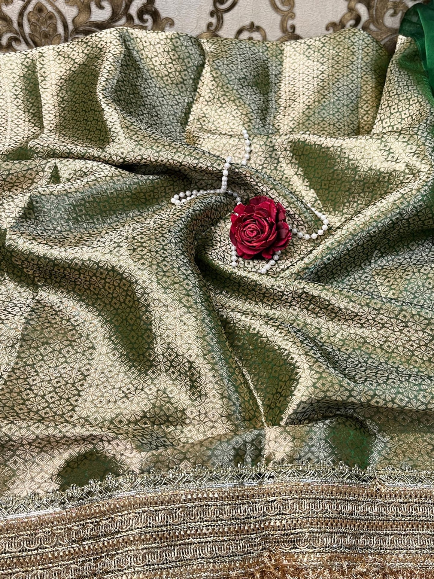 Hand-Embroidered Green Tissue Silk Saree with Twin Elephant Butas