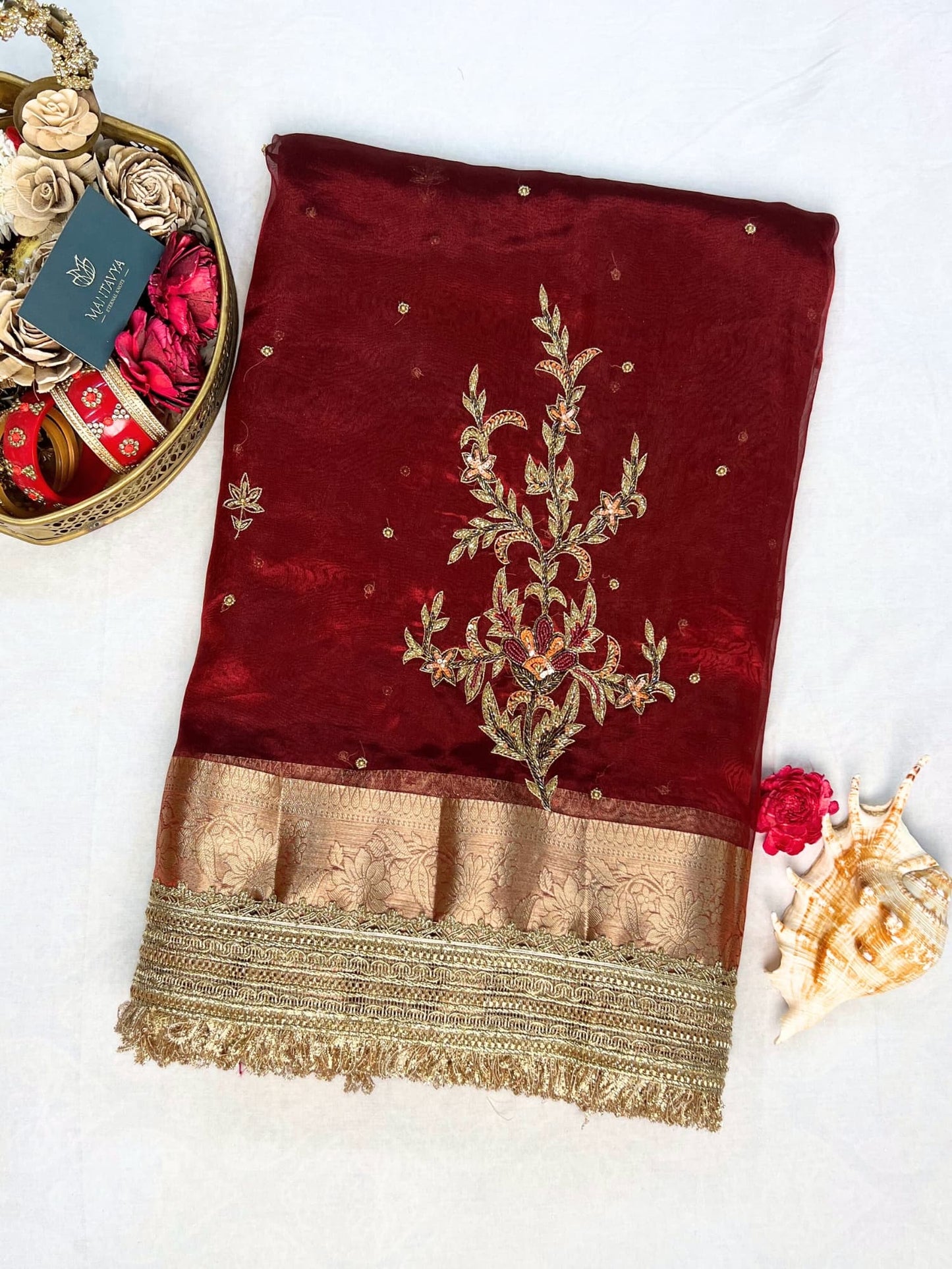 Maroon Sanjivani hand-embroidered tissue silk saree
