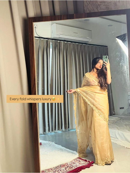 “Golden Kohinoor saree with elegant embroidery and premium silk finish for weddings”