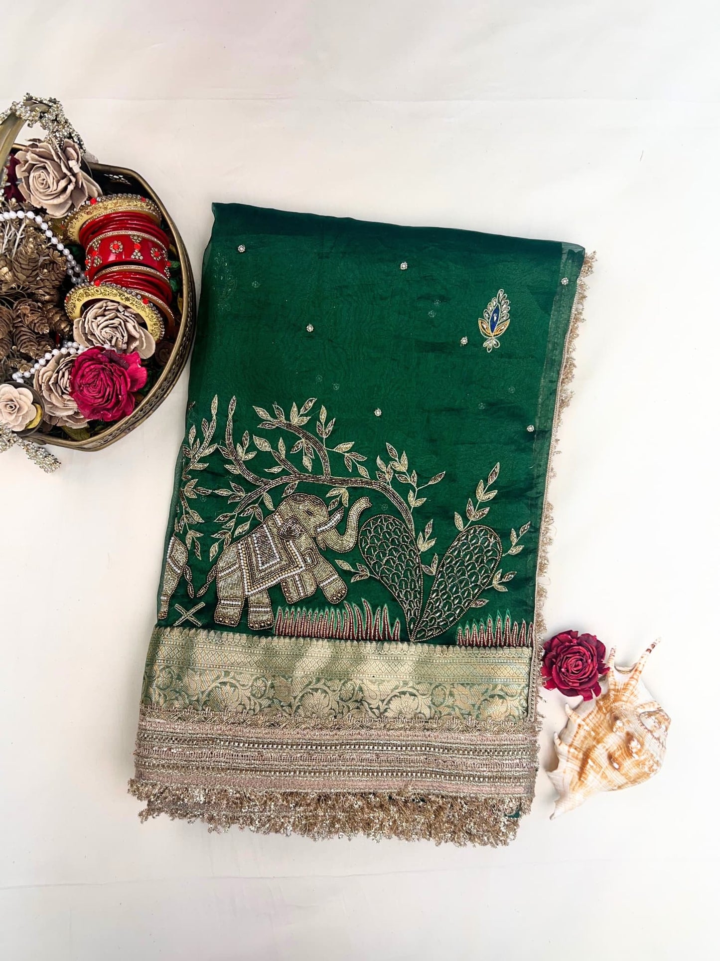 βGreen Gajodhar saree with intricate traditional weaving and festive appealβ