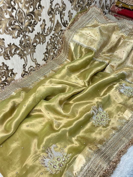 Pista green Rajhans Banarasi tissue silk saree with traditional motifs