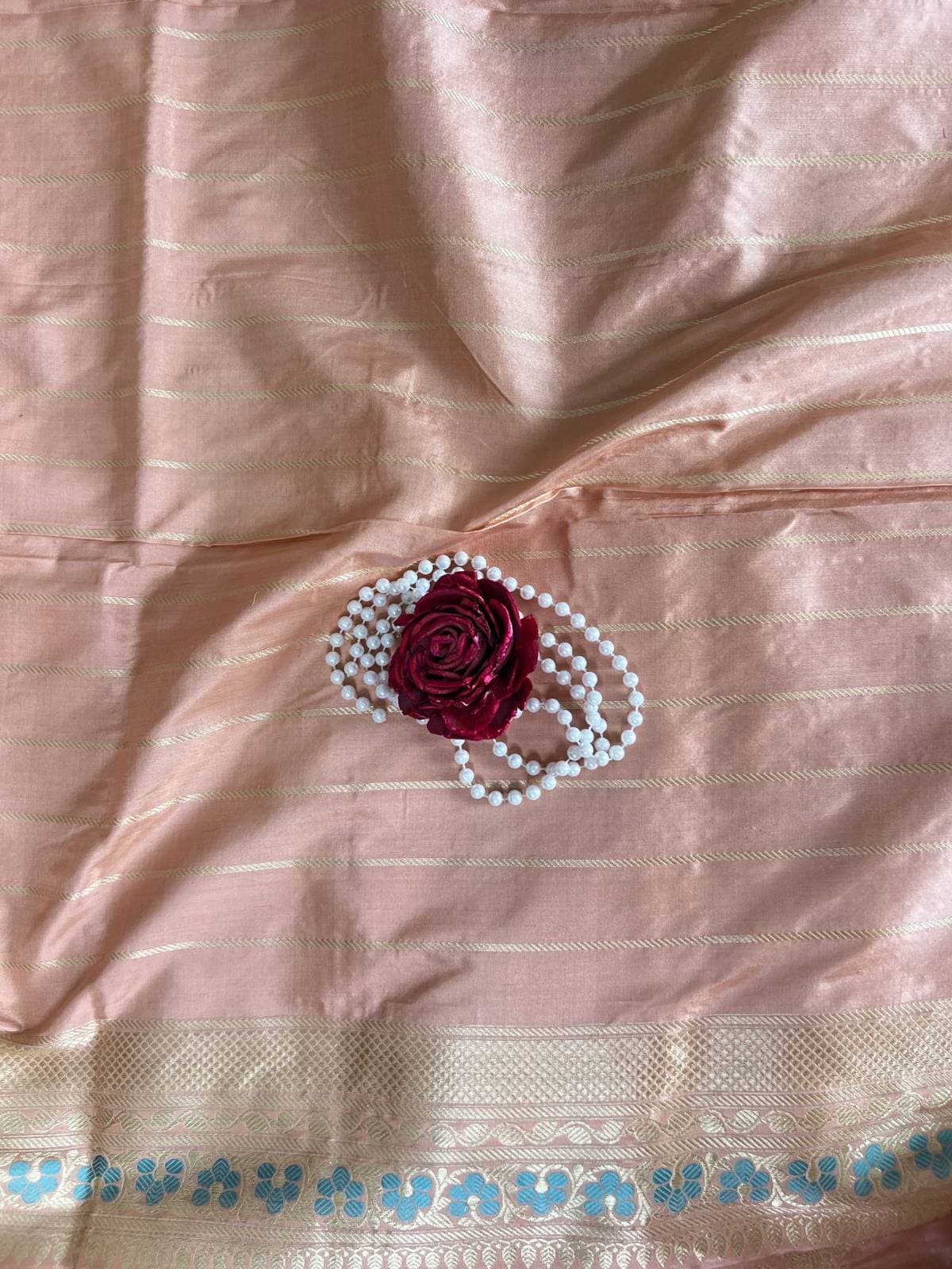 “Peach Katan Silk saree with elegant finish and traditional style”