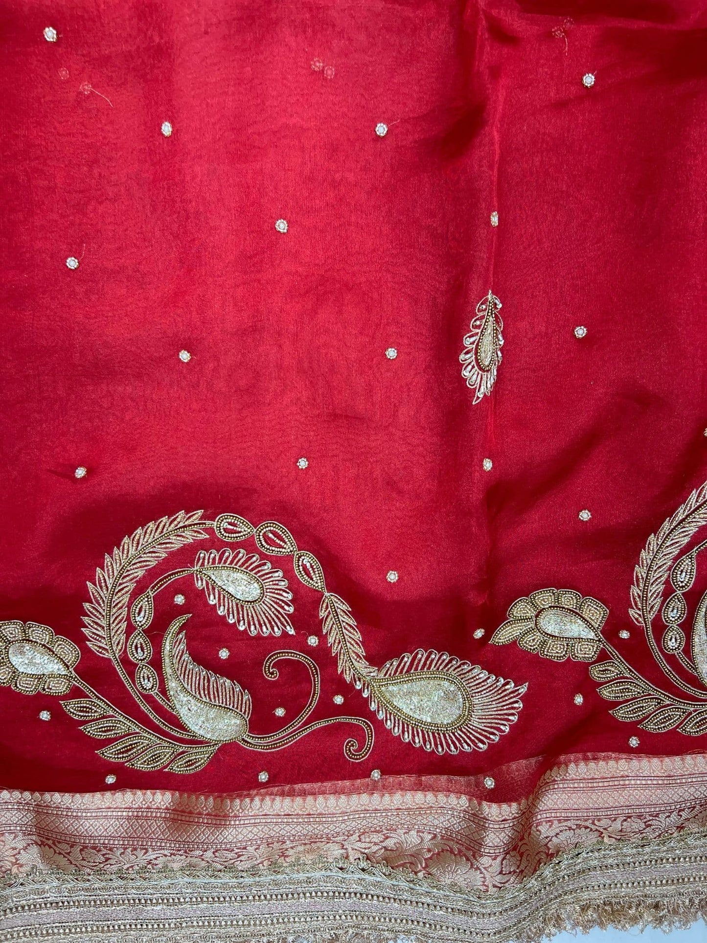 “Royal Red Mor Pankh saree with peacock feather inspired design for weddings and festivals”
