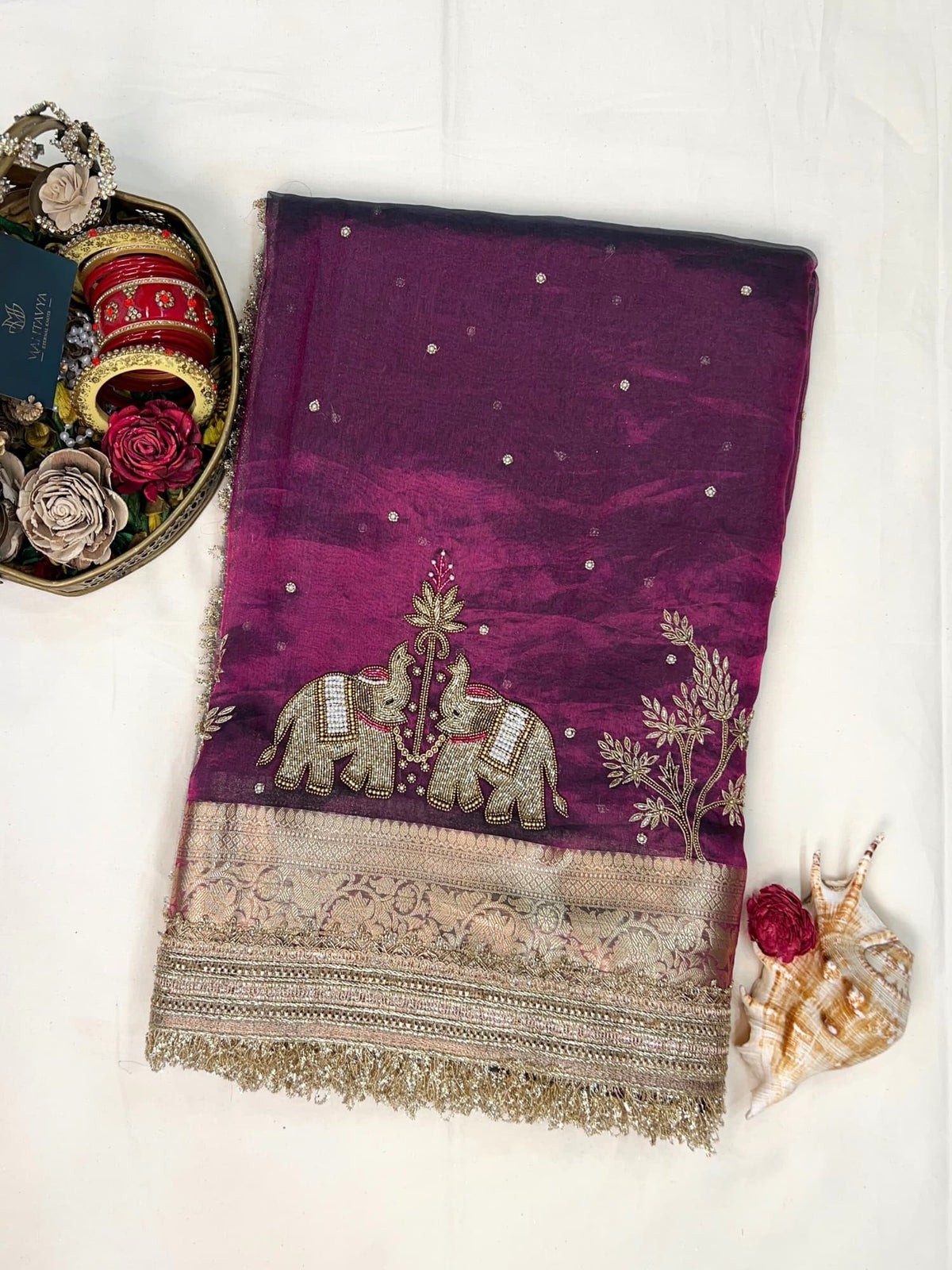 “Wine Gajraaj festive saree with rich embroidery and traditional motifs”