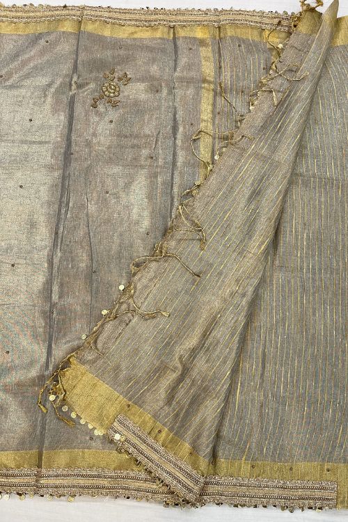 Hand-Embroidered Grey Linen Tissue Silk Saree with intricate detailing, lightweight texture, and elegant shimmer – perfect for festive and formal wear