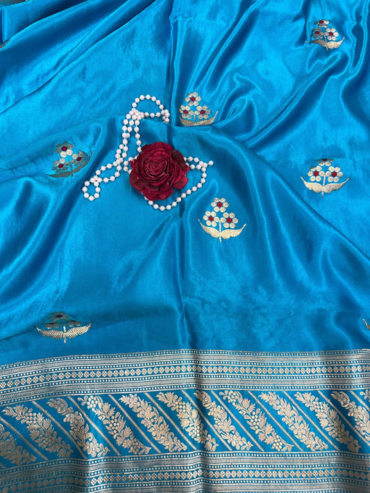 “Turquoise Blue Mashru Silk saree with elegant traditional weaving”