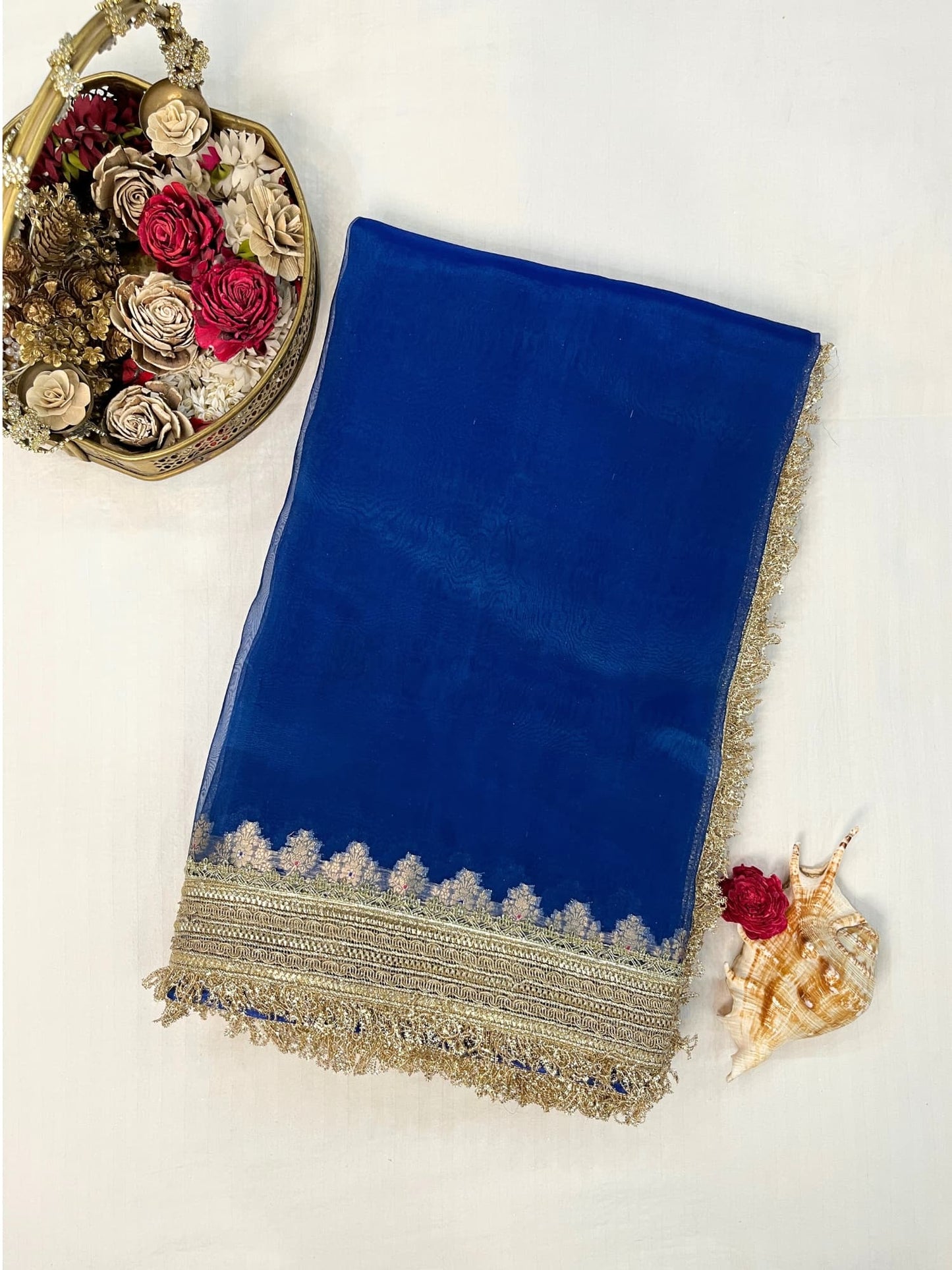 Royal blue pure Banarasi tissue silk saree with gota patti border, brocade aachal, and matching unstitched brocade blouse piece.