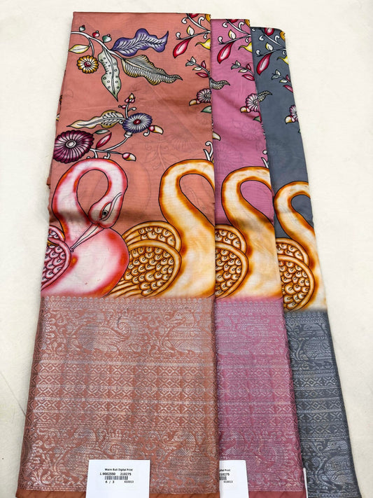 Manatavya Banaras Moonga silk saree showcasing luxurious drape, vibrant color and festive elegance