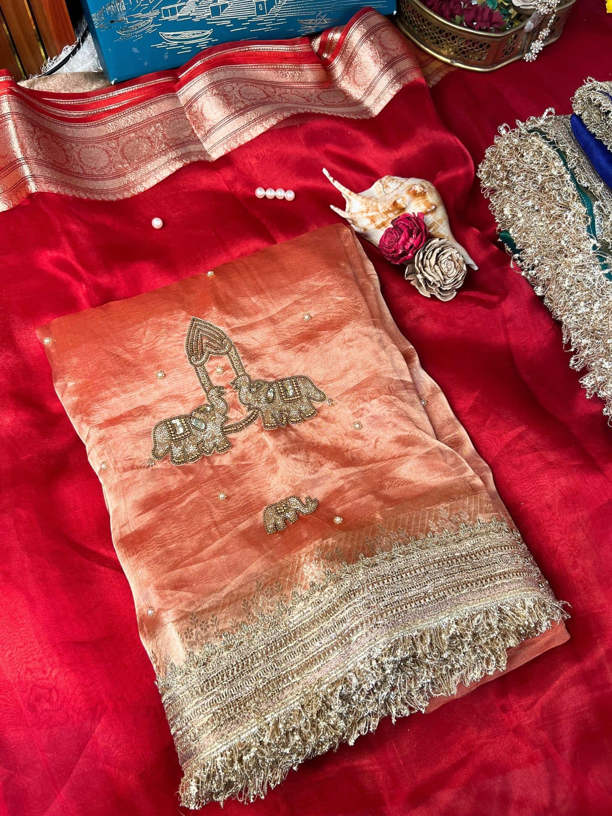 Orange Tissue Silk Saree dual elephant motifs