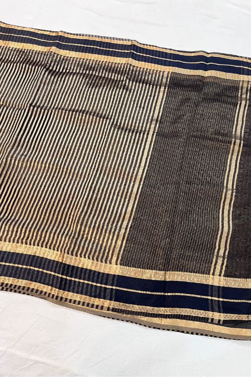Fabric: Handwoven Kora-Tissue Silk Color: Pink Blouse Piece: unstitched blouse included Specialty: Intricate Handcrafted Detailing Occasion: Weddings, Festivals, Special Celebrations