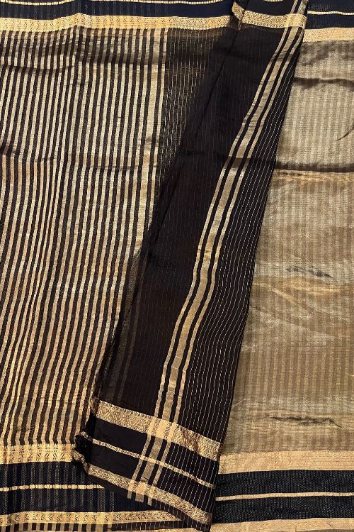 Fabric: Handwoven Kora-Tissue Silk Color: Pink Blouse Piece: unstitched blouse included Specialty: Intricate Handcrafted Detailing Occasion: Weddings, Festivals, Special Celebrations