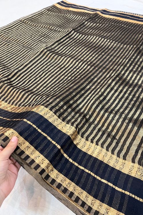 Fabric: Handwoven Kora-Tissue Silk Color: Pink Blouse Piece: unstitched blouse included Specialty: Intricate Handcrafted Detailing Occasion: Weddings, Festivals, Special Celebrations