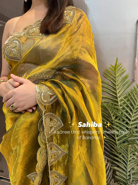 Hand-Embroidered Green Sahiba Tissue Silk Saree from Mantavya Banaras featuring intricate handcrafted motifs, perfect for weddings and festive occasions.