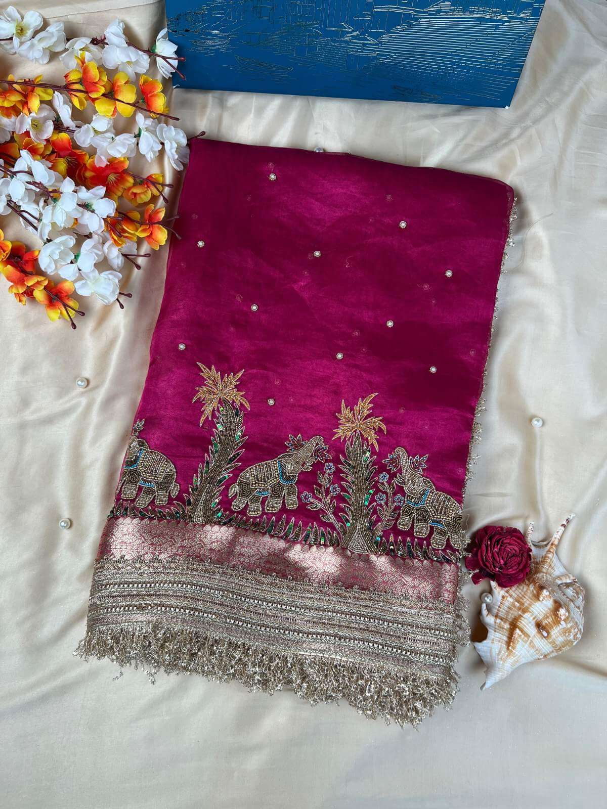 Hot pink Tissue Silk Saree Gajgamini with graceful traditional patterns Front view