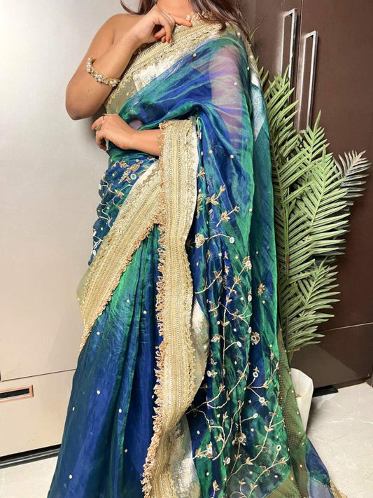 Peacock blue Gulmohar Banarasi silk saree with elegant floral design