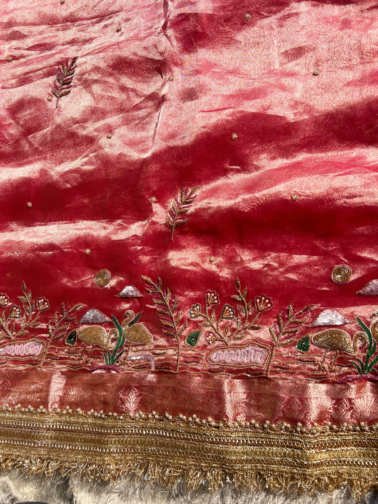 “Rose Pink Flamingo saree with vibrant color and elegant traditional motifs”