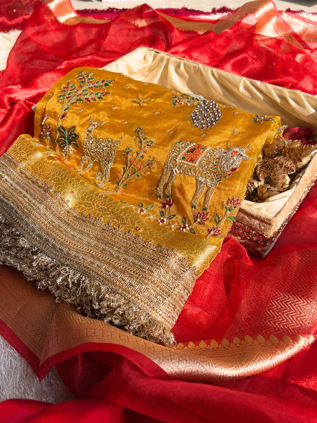 Manatavya Banaras yellow Radha Krishna saree featuring handwoven motifs, vibrant color and traditional festive design