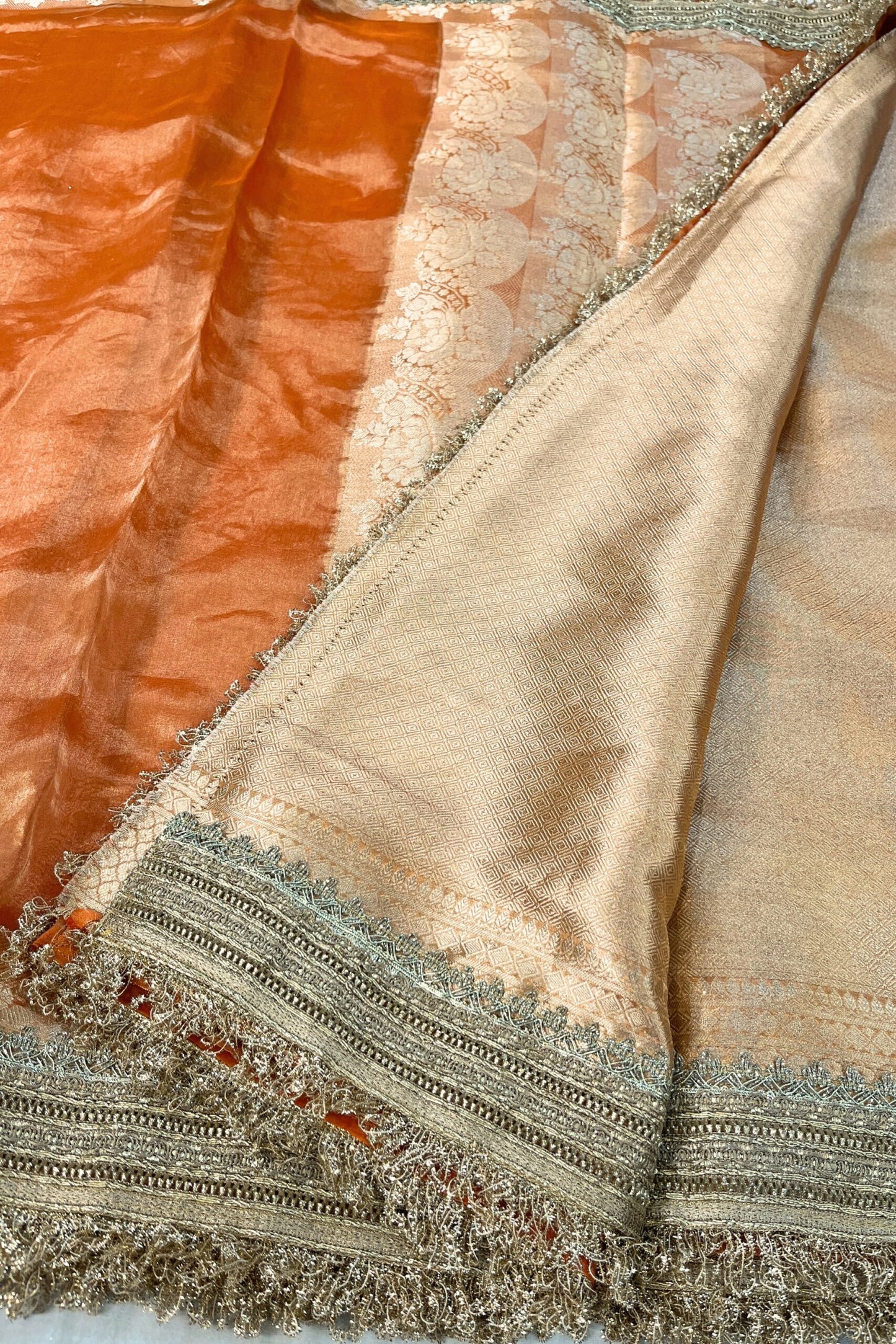 Orange Pure Banarasi Tissue Silk Saree with Gota Patti border, rich brocade Aachal, and unstitched brocade blouse piece – handcrafted in Banaras.