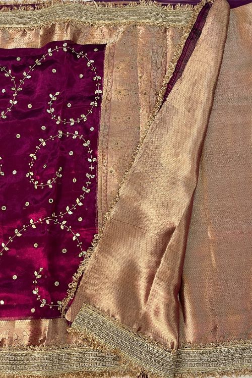 Hand Embroidered Wine Jaal Tissue Silk Saree featuring mirror work embroidery and scattered buti design, paired with unstitched wine blouse – elegant ethnic wear for weddings and festive occasions.