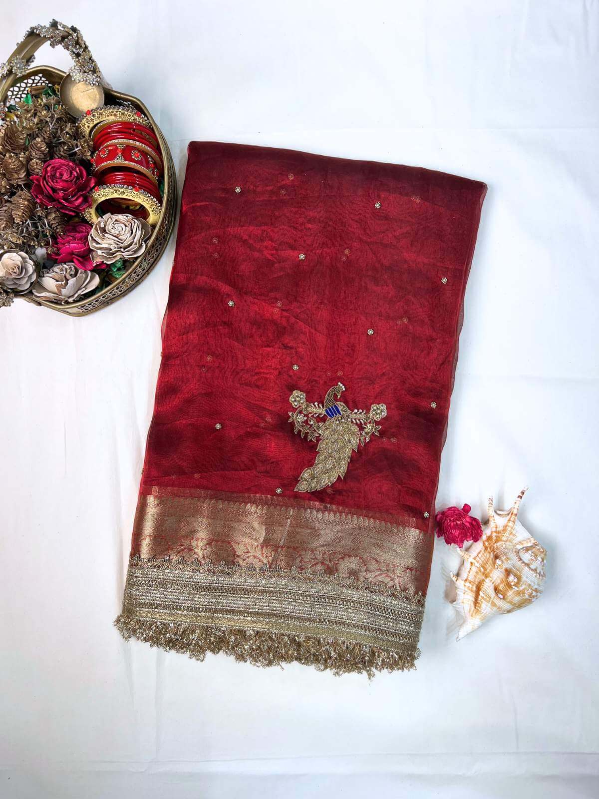 Royal red Mayur Banarasi tissue silk saree with hand-embroidered floral and bird motifs in gold zari