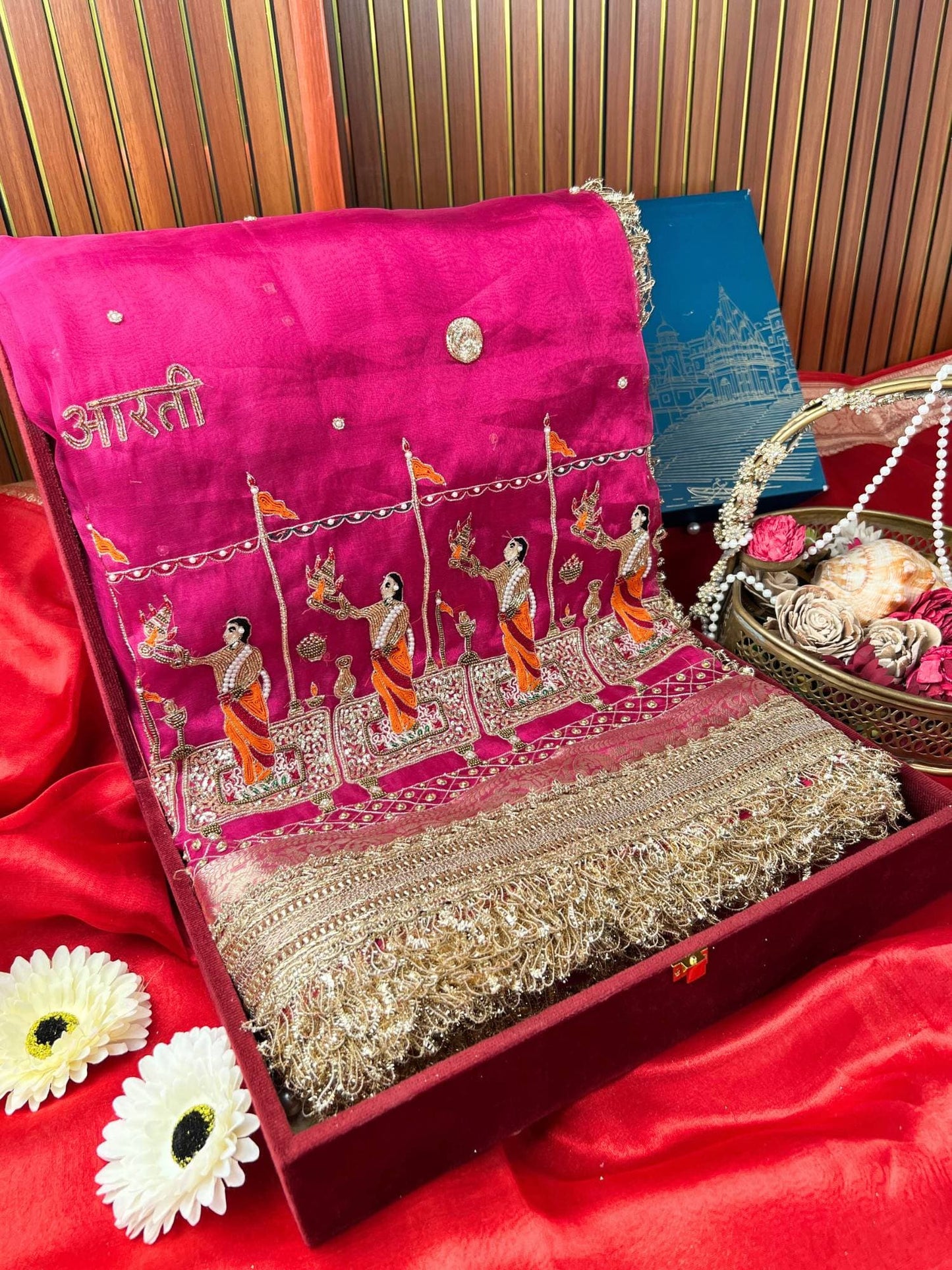 Manatavya Banaras hot pink Ganga Aarti saree featuring sacred Ganga Aarti motifs, vibrant color and traditional Banarasi craftsmanship