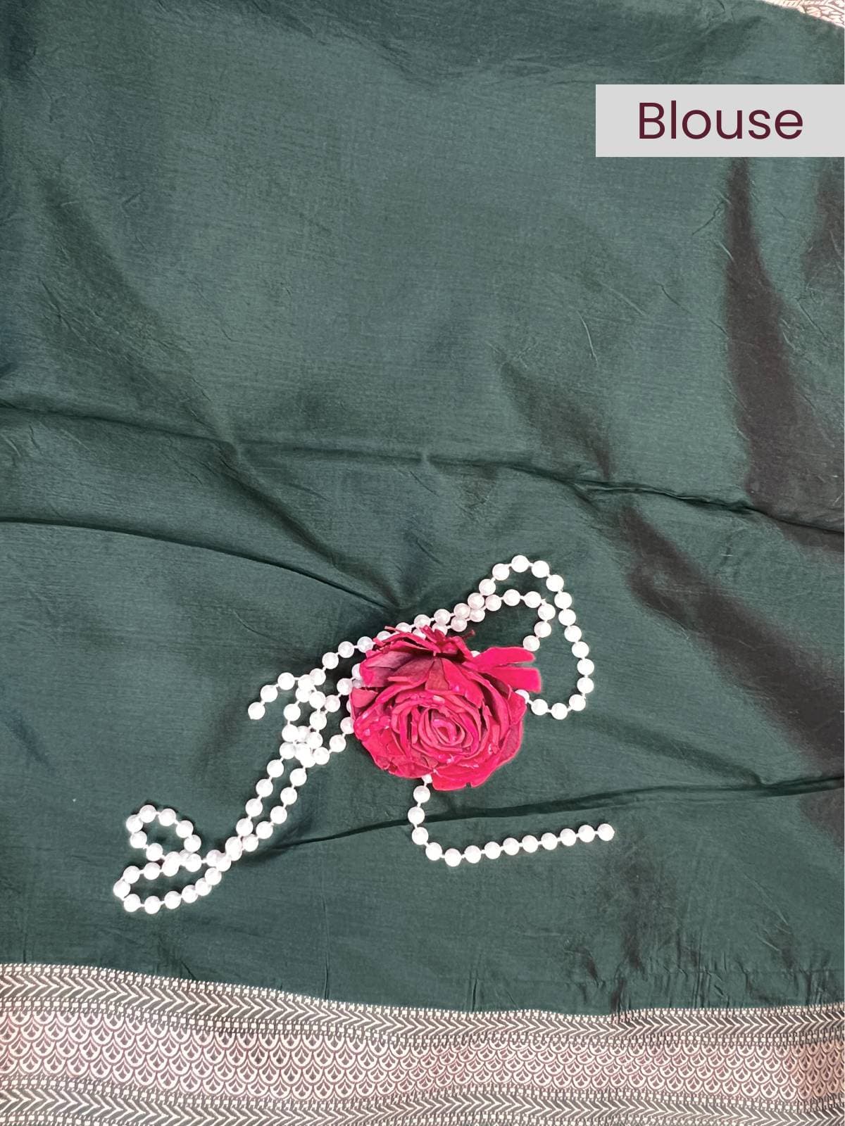“Bottle Green Katan Silk saree with premium fabric and traditional motifs”