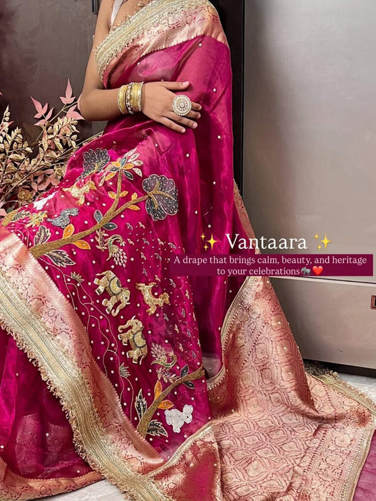 Hot pink Vantara Banarasi silk saree with bold traditional motifs