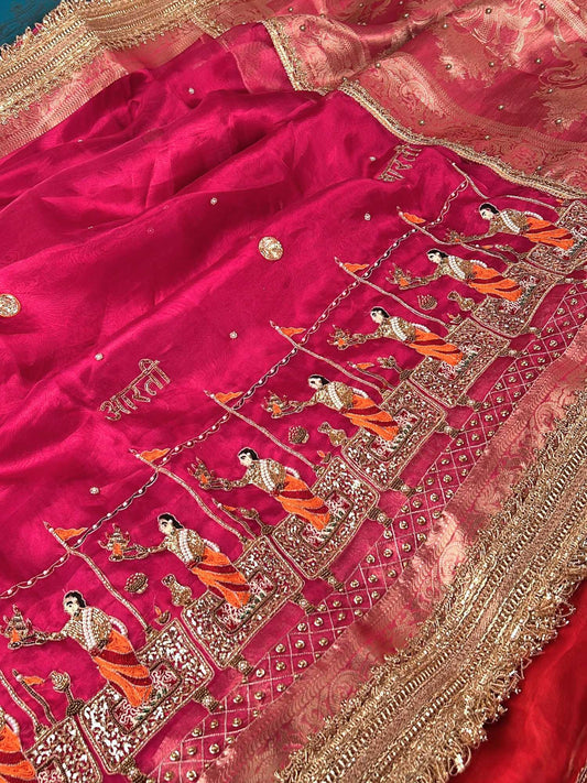 Manatavya Banaras hot pink Ganga Aarti saree featuring sacred Ganga Aarti motifs, vibrant color and traditional Banarasi craftsmanship
