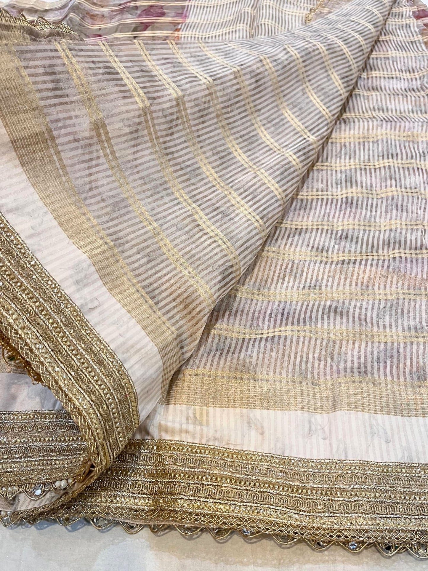 Golden Banarasi Tissue Silk Saree with gota patti border, brocade aachal, and unstitched brocade blouse – handwoven in Banaras.