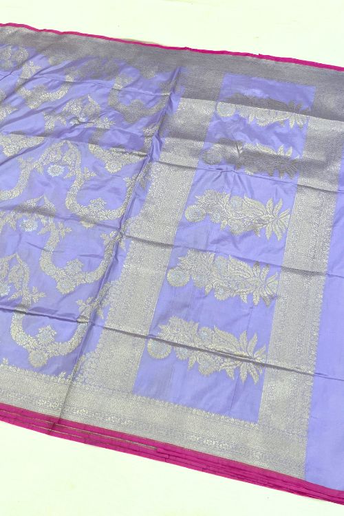 Handwoven Lilac Katan Silk Saree with gold and silver zari floral motifs, contrast selvedge border, and matching unstitched blouse