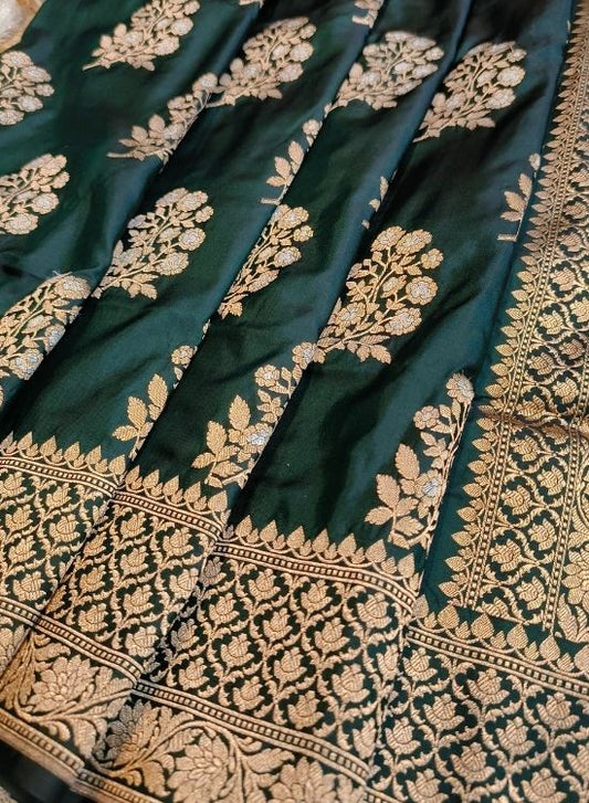 Handwoven Bottle Green Katan Silk Saree by Mantavya with rich golden zari detailing