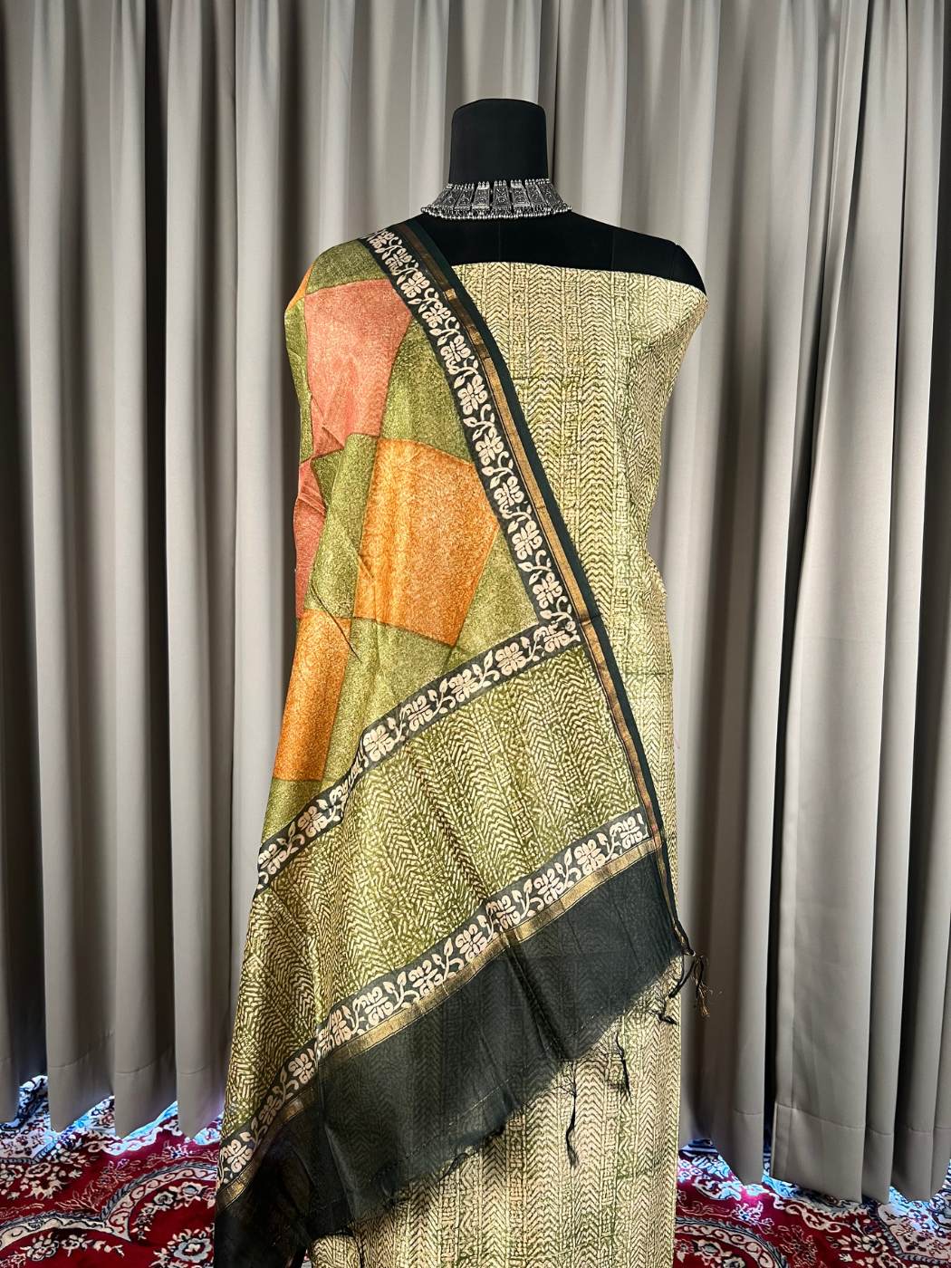 Olive Green Mul Chanderi Suit with floral and abstract hand block Closeup view