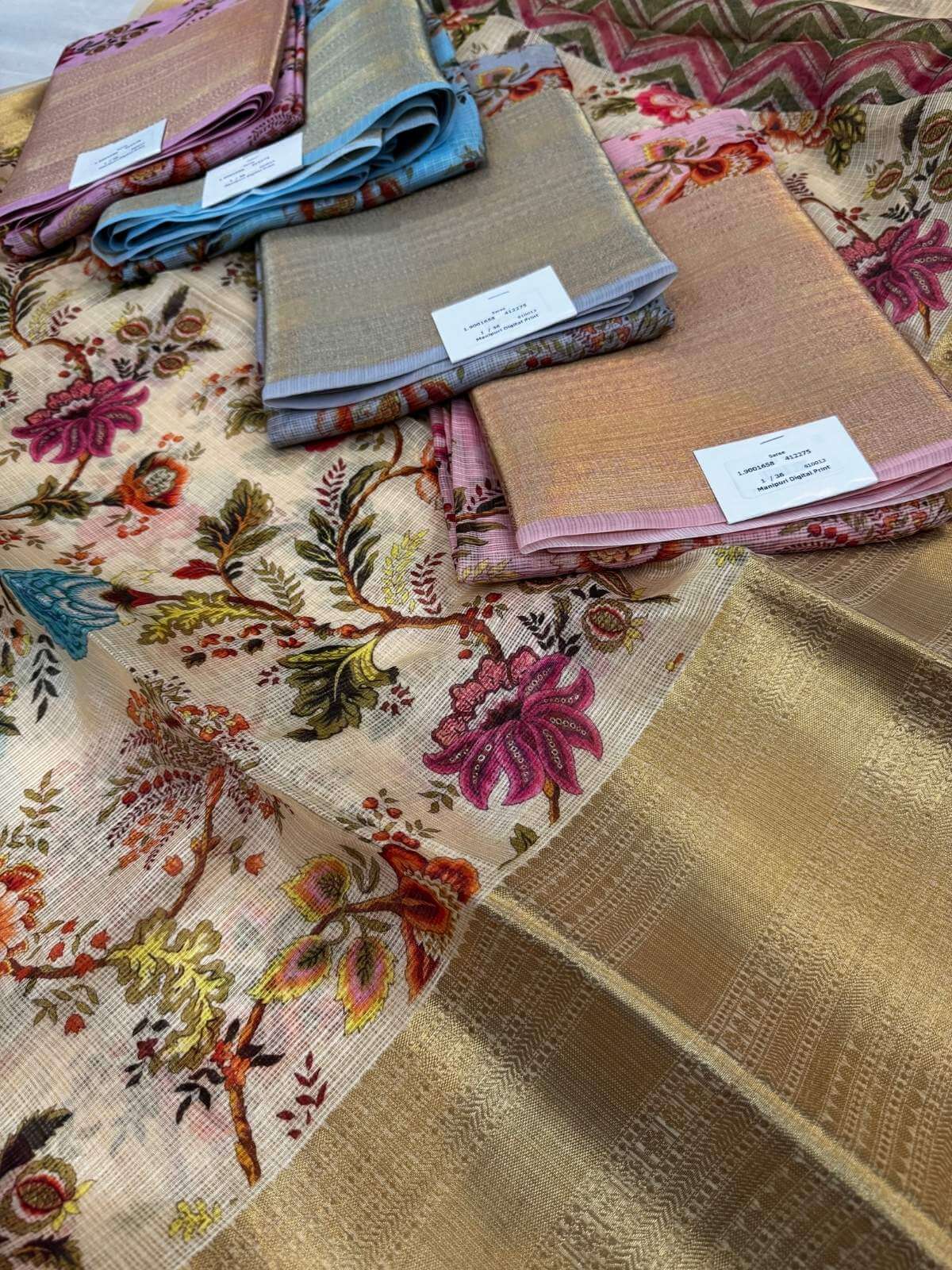 Ivory Cream Manipuri Kota silk saree with delicate handwoven detailing closeup view