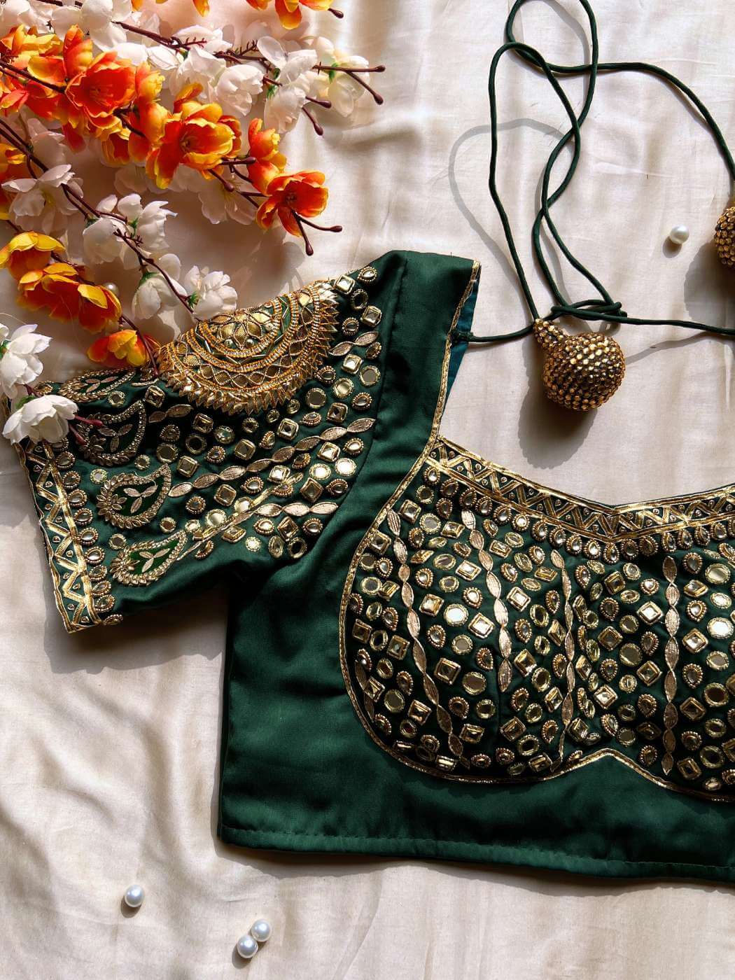 Green Banarasi silk blouse designed for traditional sarees