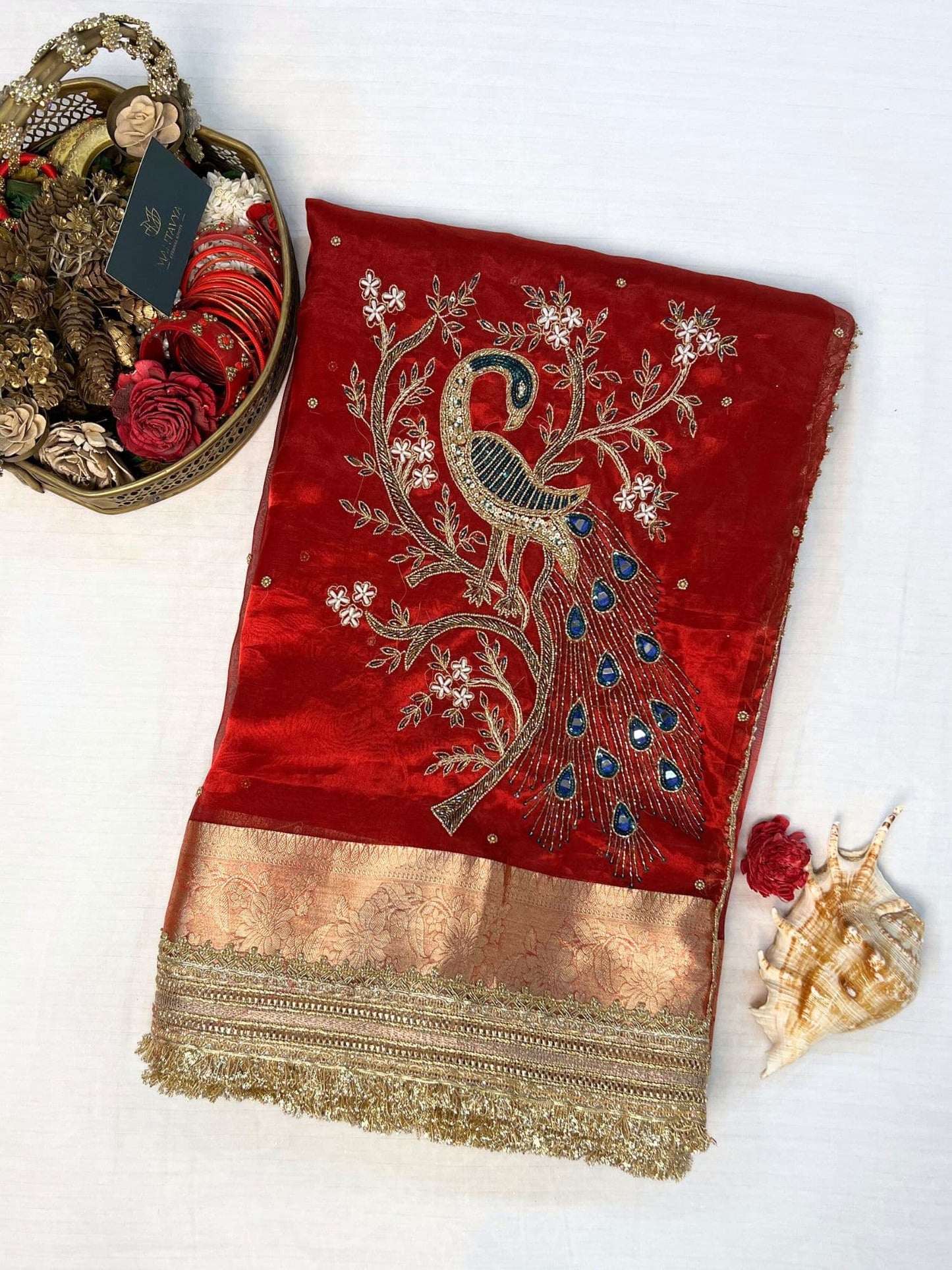 βRed Morni traditional Indian saree with intricate designβ
