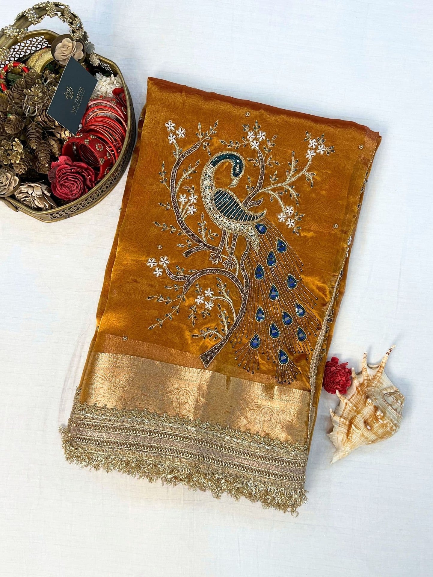 “Kanjivaram Gold Morni silk saree with elegant zari work”