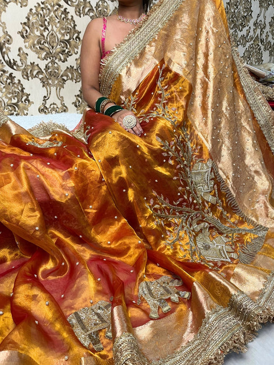 Elegant Kanjivaram Gold Tissue Silk Saree with traditional Elephant corner design